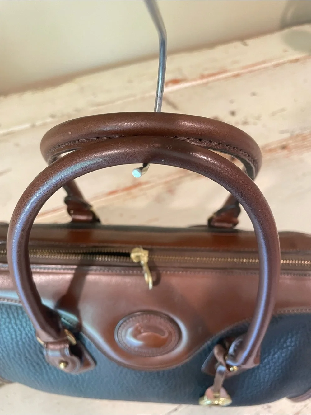 Dooney & Bourke vintage AWL Black and Brown Pebbled Leather Satchel / crossbody